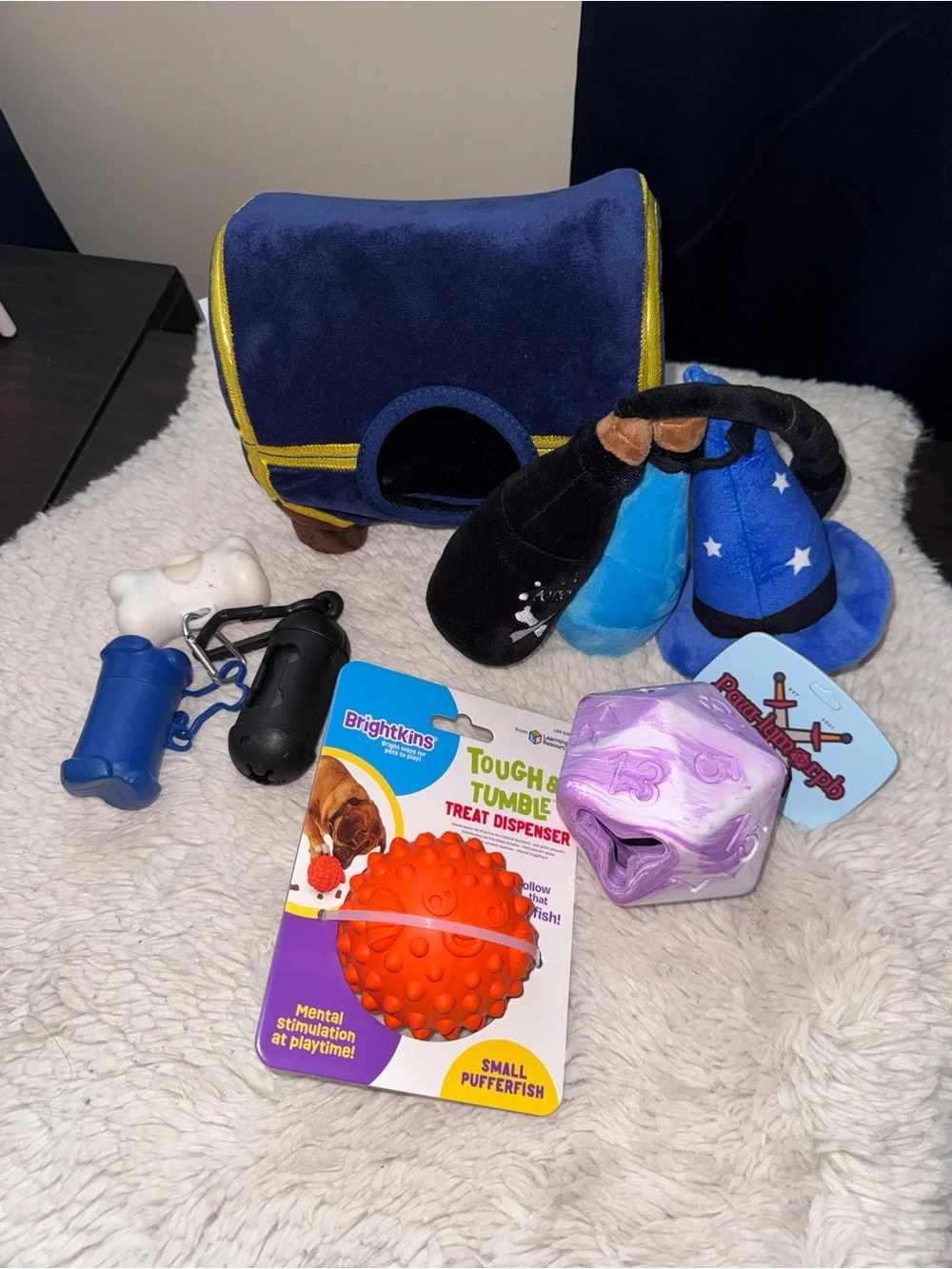 Dog Toys, Treat Dispensers, And Waste Bag Dispensers Bundle